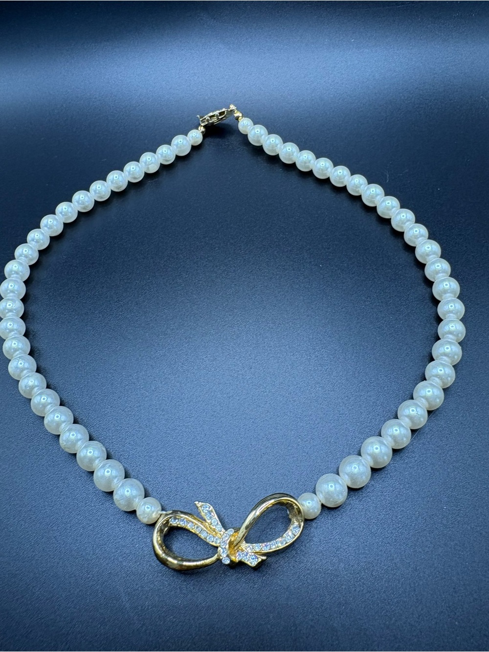 White Pearl Necklace with Gold Bow